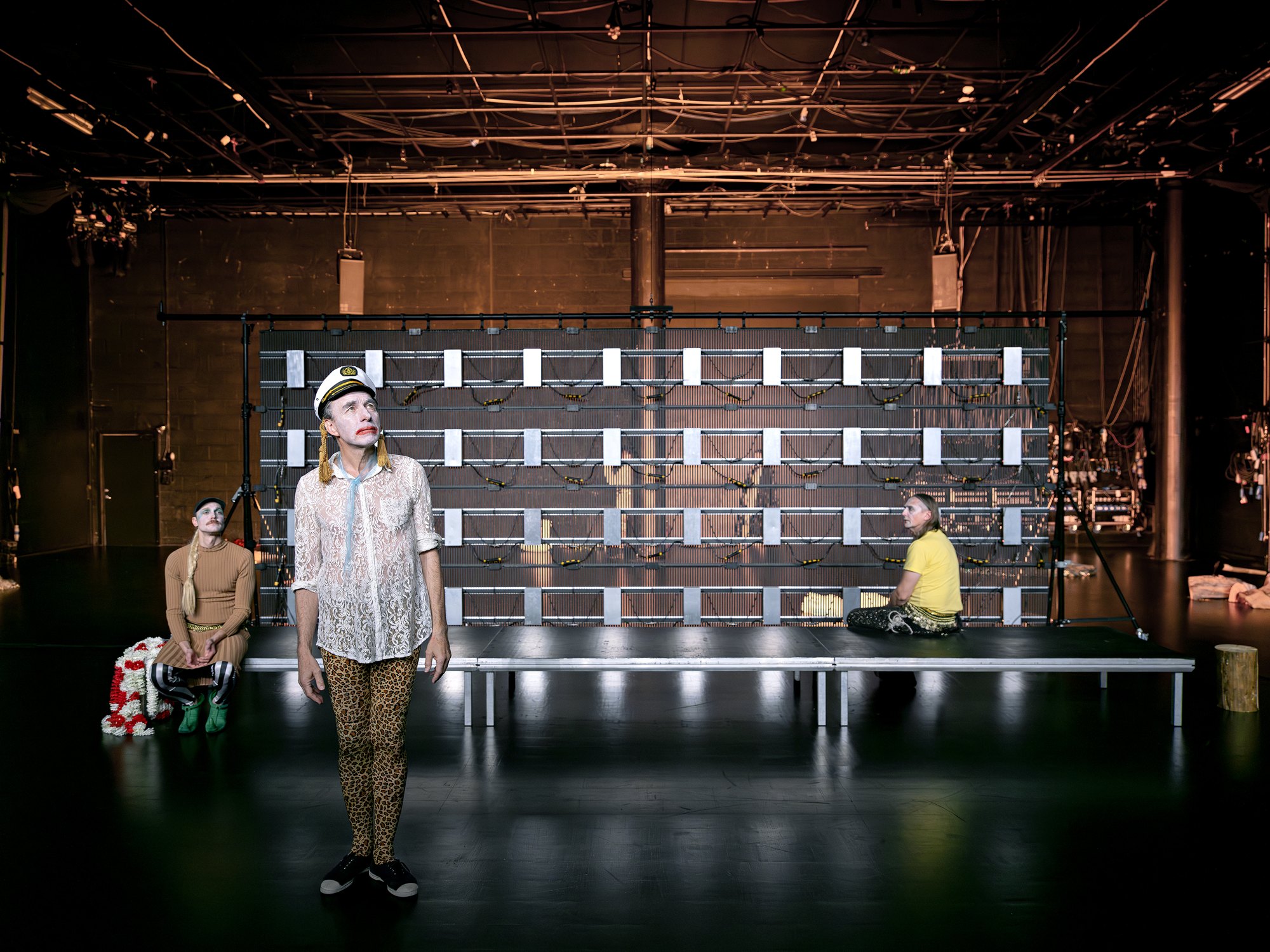 Solaris: three performers in an industrial stage space