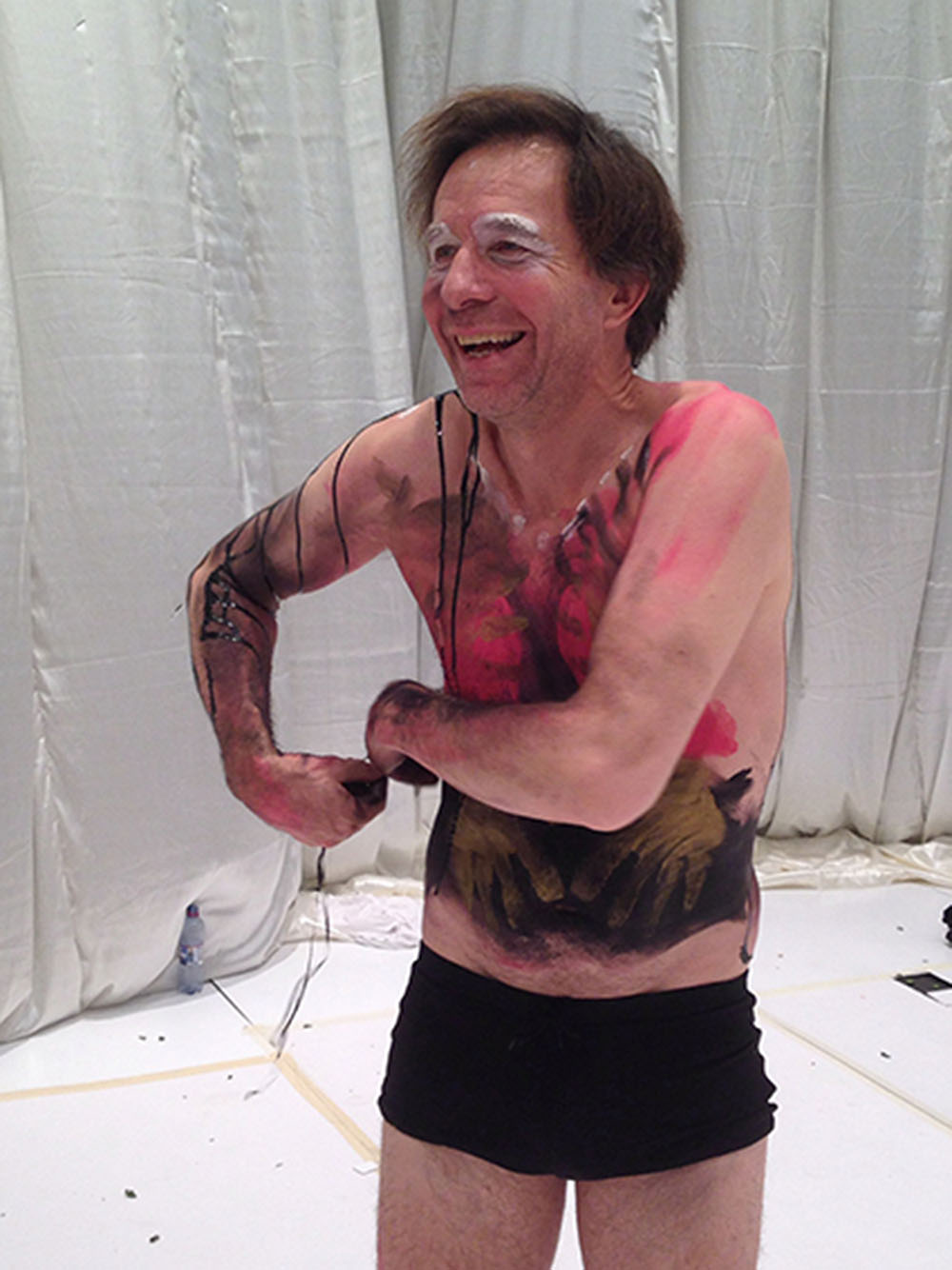 Paradise Now — performer with painted torso