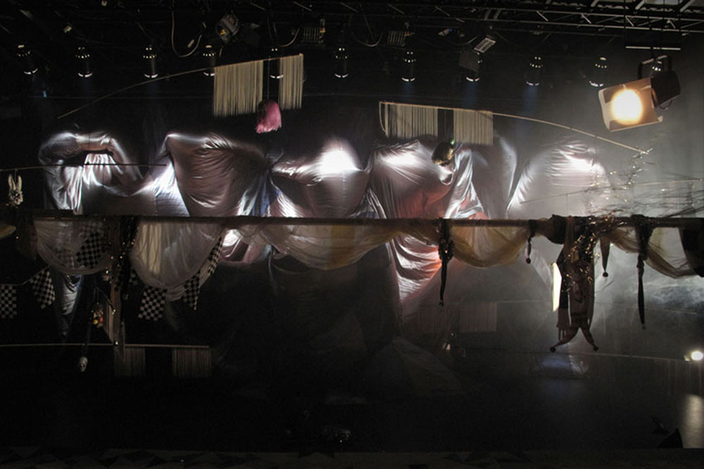 Stalker — illuminated fabric and suspended figures in the theatre space